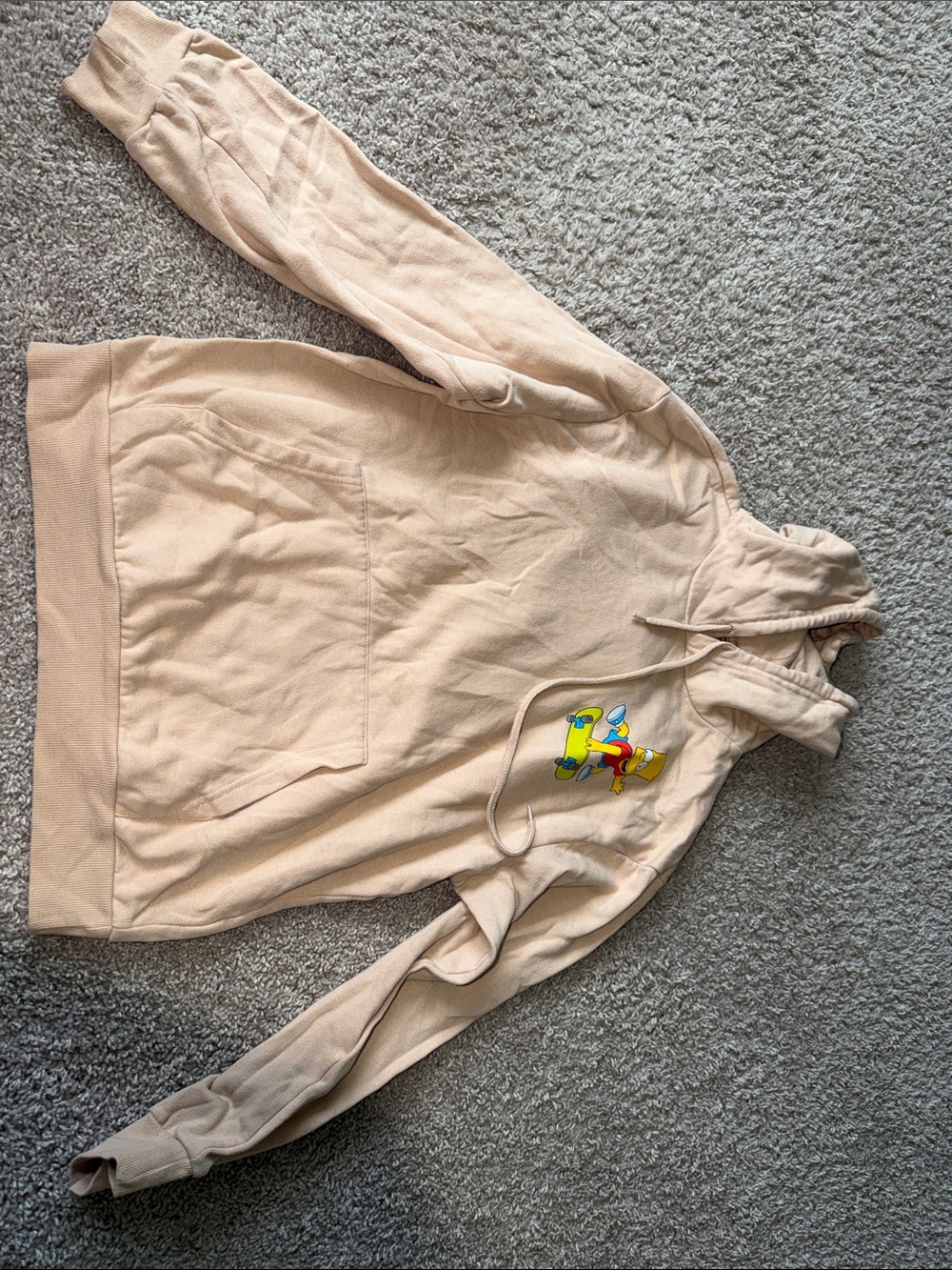 Simpsons Beige Hoodie with Colorful Skateboard Graphic